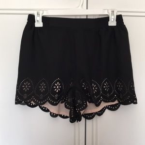 Black shorts with floral edging